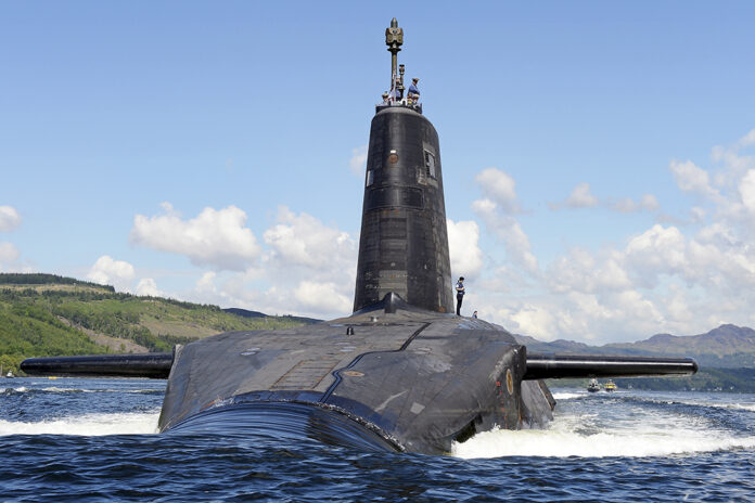 A submarine on the water surface with its tower visible, set against a backdrop of hills and clouds, resembles a veteran transitioning from the depths of duty to the calm of Civvy Street.