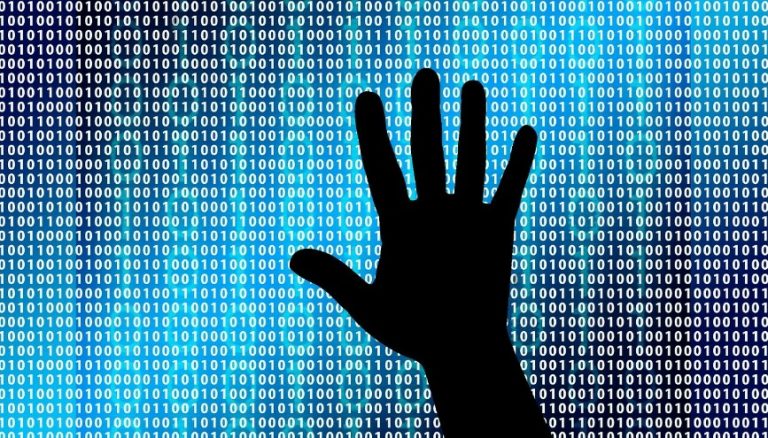 A silhouette of a hand is raised against a background of binary code, consisting of zeros and ones in blue, symbolizing the transition from Civvy Street to the digital realm.