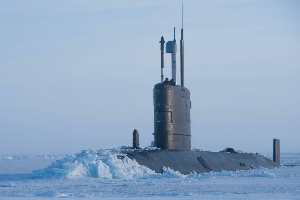 Submarine Breaks Through Arctic Ice For Major Exercise