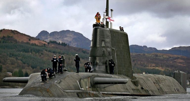 A military submarine surfaces in a body of water surrounded by hills, its presence a stark contrast to life on Civvy Street. Several crew members are visible on top, standing and crouching, embodying the spirit of veterans adapting to new horizons.