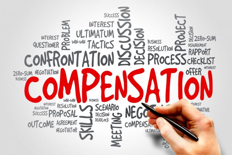 A hand writes "COMPENSATION" in red, surrounded by black words like discussion, negotiation, and confrontation on a white background—mirroring a veteran's resettlement journey after Civvy Street.