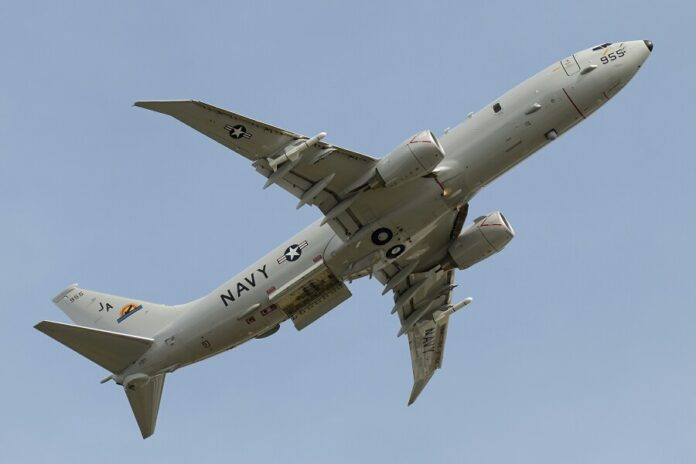 A U.S. Navy aircraft, marked with 