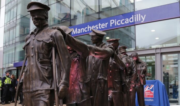 Statues of blinded WW1 soldiers, unveiled at Manchester Piccadilly Station, are part of the 