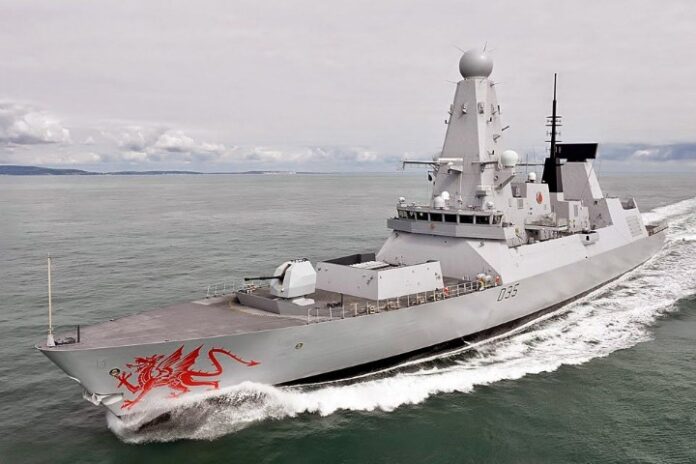 The sleek naval warship with the designation D35 glides through the water, its grey hull bearing a red dragon emblem on the bow, embodying a strong Gulf Security presence as part of a broader Defence Agenda set by Chiefs of Defence.
