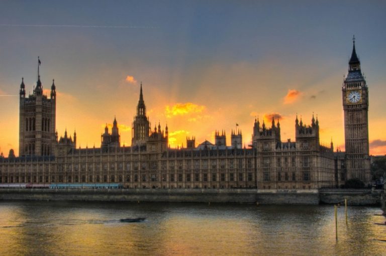 The Palace of Westminster and Big Ben at sunset, viewed from across the River Thames, offers a world-class backdrop that captivates visitors with its historic charm.