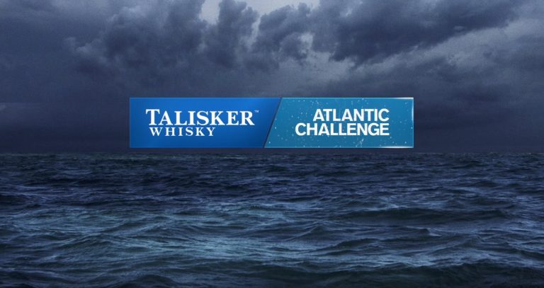 Dark stormy sea with a cloudy sky. Text overlay reads "Talisker Whisky Atlantic Challenge: The World’s Toughest Rowing Race.