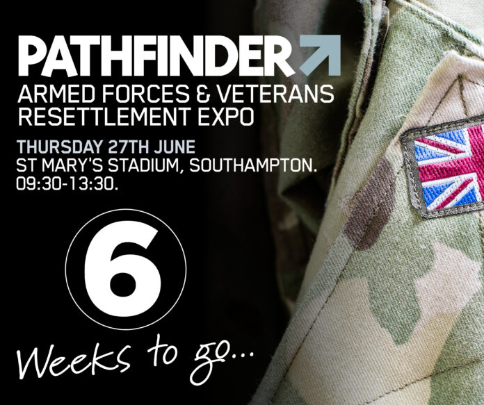 Camouflage uniform with Union Jack patch. Text: 
