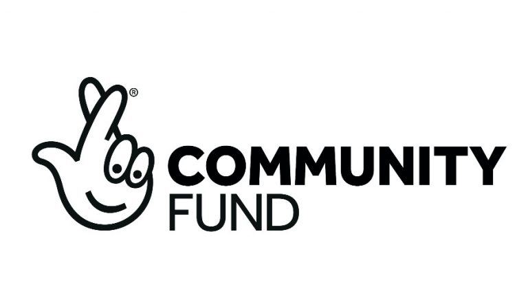 Logo featuring a crossed fingers symbol and the words "Community Fund" in bold letters, symbolizing hope to transform Veterans' Lives.