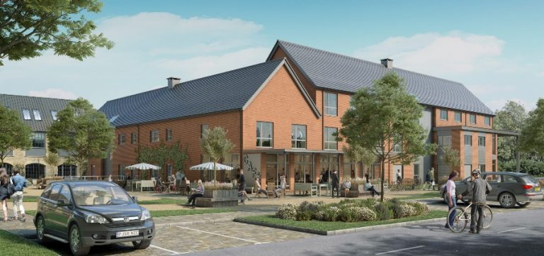 This modern, purpose-built structure features a gray roof, with outdoor seating and tables seamlessly blending into the scene. Cars are parked as people walk and cycle nearby. Trees and a clear sky enhance the inviting atmosphere of this innovative hub.