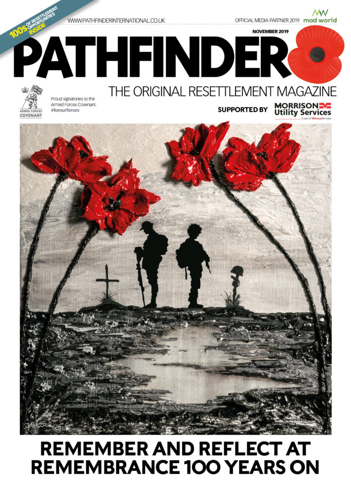 Cover of Pathfinder International magazine featuring silhouettes of soldiers against red poppy artwork. The headline reads, 