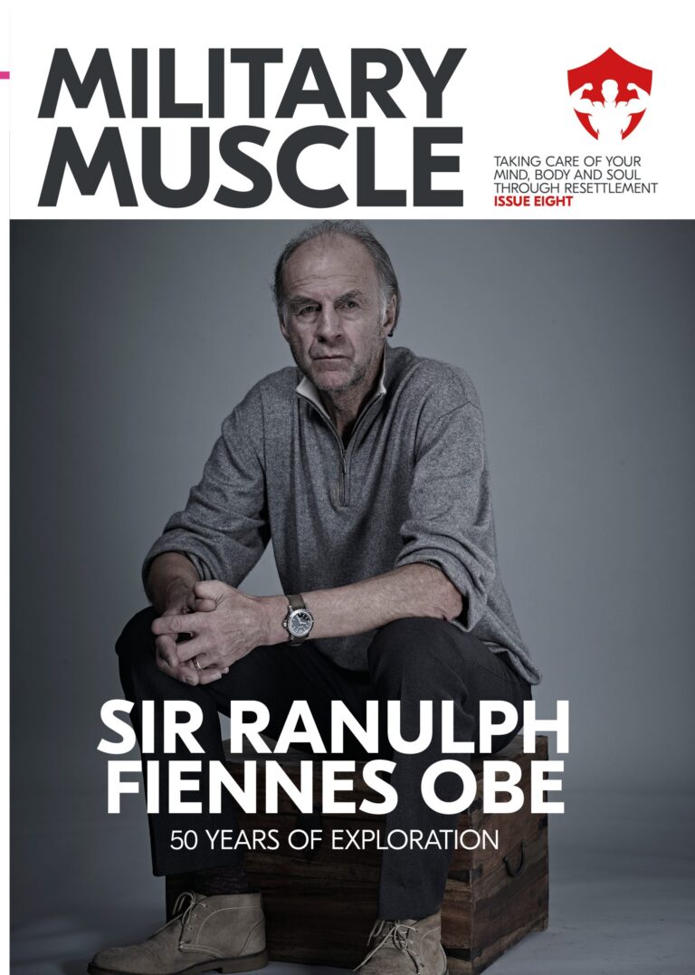 Sir Ranulph Fiennes, a renowned Military veteran, sits on a stool in a grey pullover on the cover of Military Muscle magazine issue eight, highlighting 50 years of exploration.