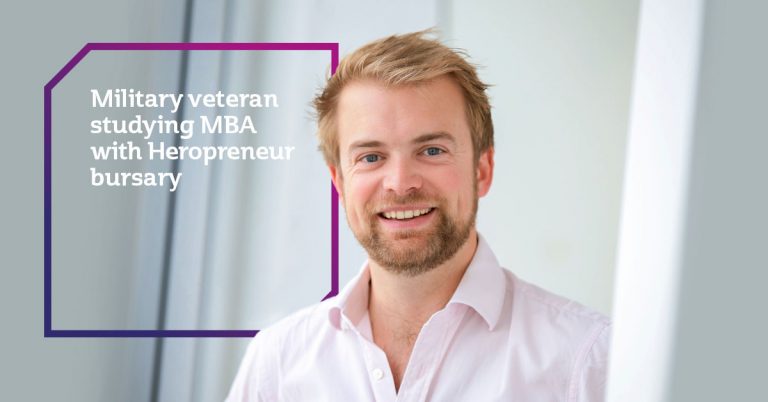 A smiling man in a light pink shirt stands indoors next to text that reads, "Military Pathfinder and veteran studying MBA with Heropreneur bursary.