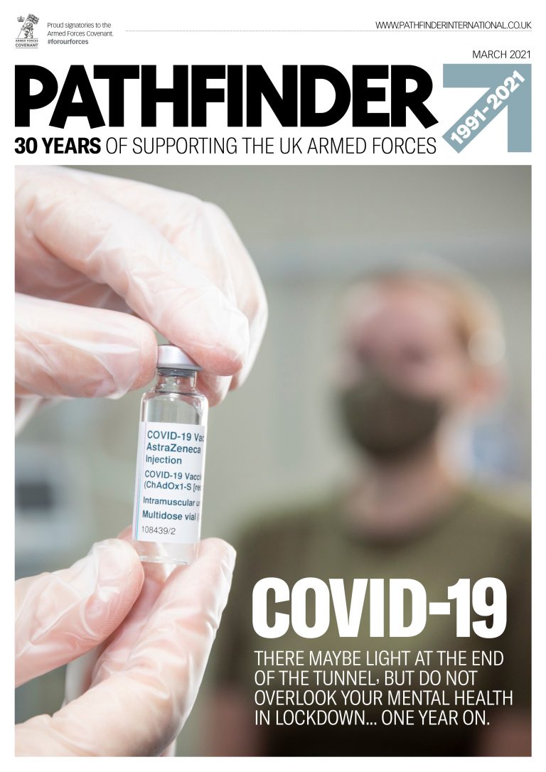A gloved hand holds a vial labeled "COVID-19 Vaccine AstraZeneca" on the cover of Pathfinder magazine, March 2021, with a headline about Veteran mental health during the pandemic.