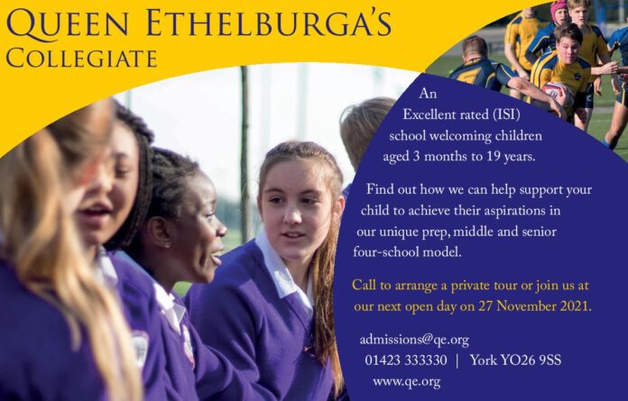 A group of schoolgirls in uniform sits together outside, with a rugby match and a Royal Navy veteran in the background. Text promotes Queen Ethelburga’s Collegiate and an open day event.