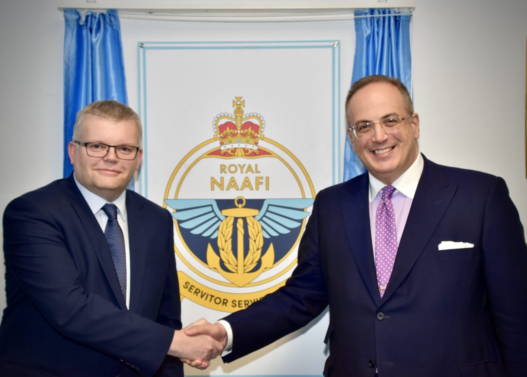 Steve Marshall CEO of NAAFI with Rt Hon Michael WLLIS QC MP and the Royal NAAFI crest 