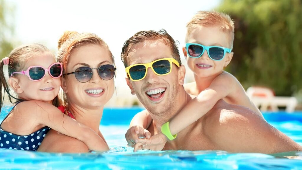 Family in swimming pool