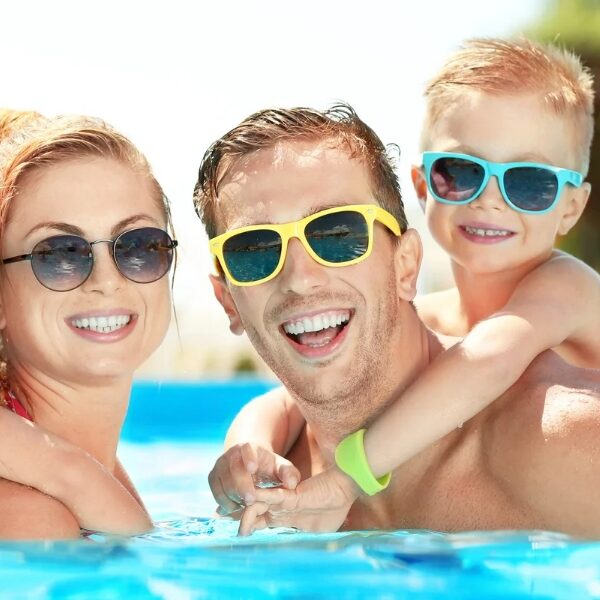 Family in swimming pool