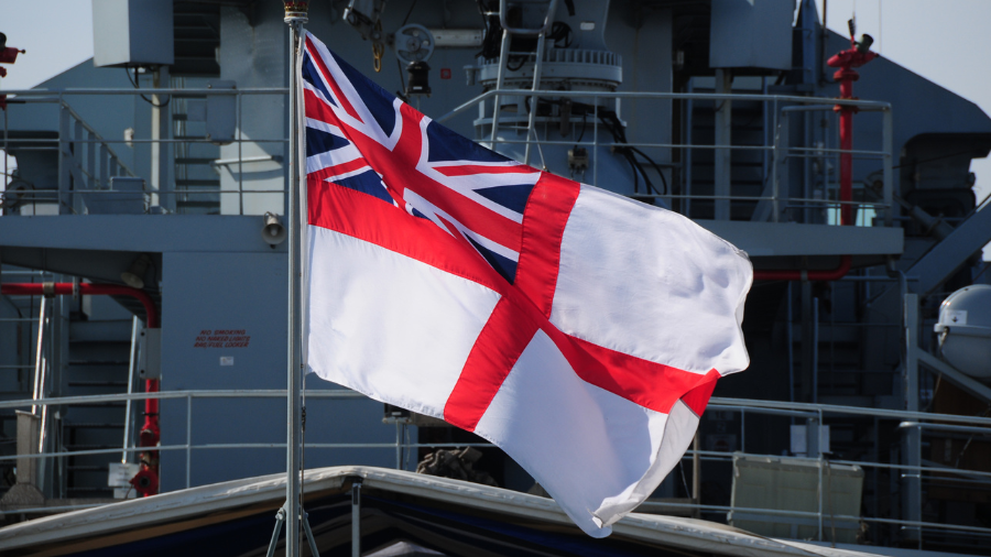 Union Jack and Ensign on ship