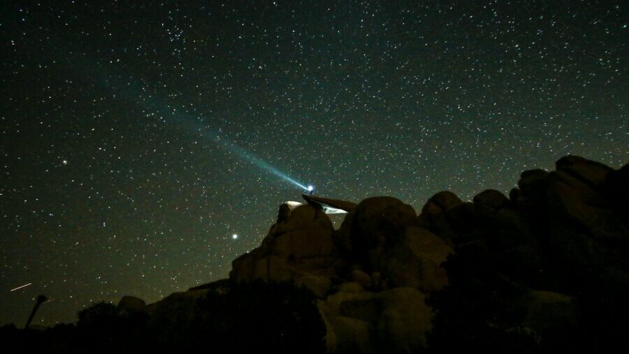 rock formations under starry night