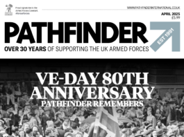 Magazine cover of Pathfinder's April 2025 issue, showcasing a historic photo of a jubilant crowd holding a Union Jack, celebrating the 80th anniversary of VE Day.