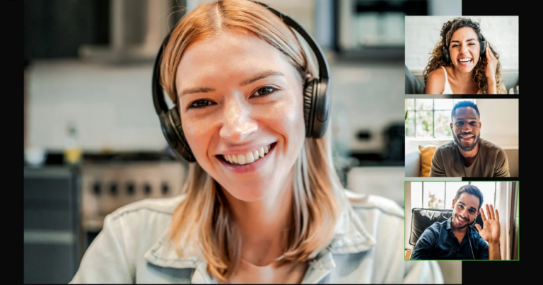 A person wearing headphones, joining a video call with three others shown in smaller frames on the side, all smiling. This lively session about "What Works" offers veterans insights into access services that can make a difference.