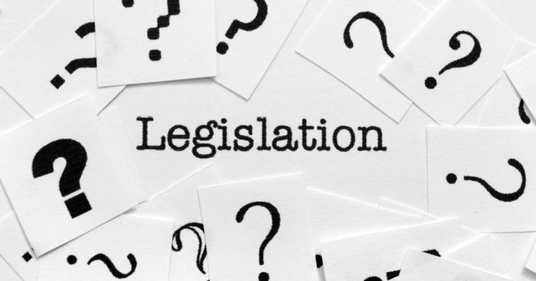 The word "Legislation" stands prominently amidst scattered question mark cards on a white background, echoing the uncertainty around the Armed Forces Covenant.