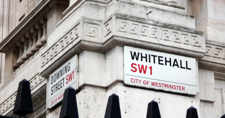 Street signs for Whitehall and Downing Street, emblazoned with the City of Westminster and SW1 postal code, evoke the historic corridors where UK leaders deliberate on vital matters like military equipment and global alliances, including support for Ukraine.