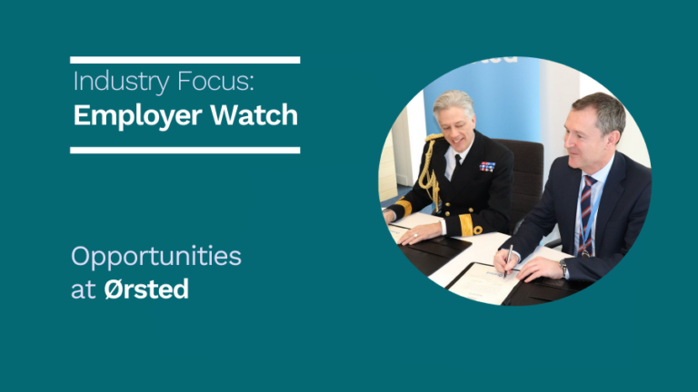 Two men in business attire, one in a military uniform, sit at a table signing documents with "Employer Watch" and "Opportunities at Ørsted" displayed beside them.