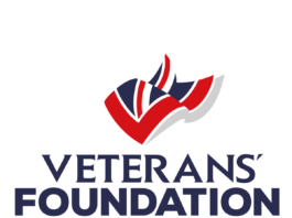 The Veterans’ Foundation logo features a stylized red, white, and blue design above the organization’s name in bold navy text, representing its strong support for Armed Forces charities through initiatives like the Major Grants Scheme.